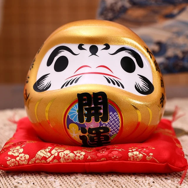 Hucha Daruma con Cojín - 11cm Dorado